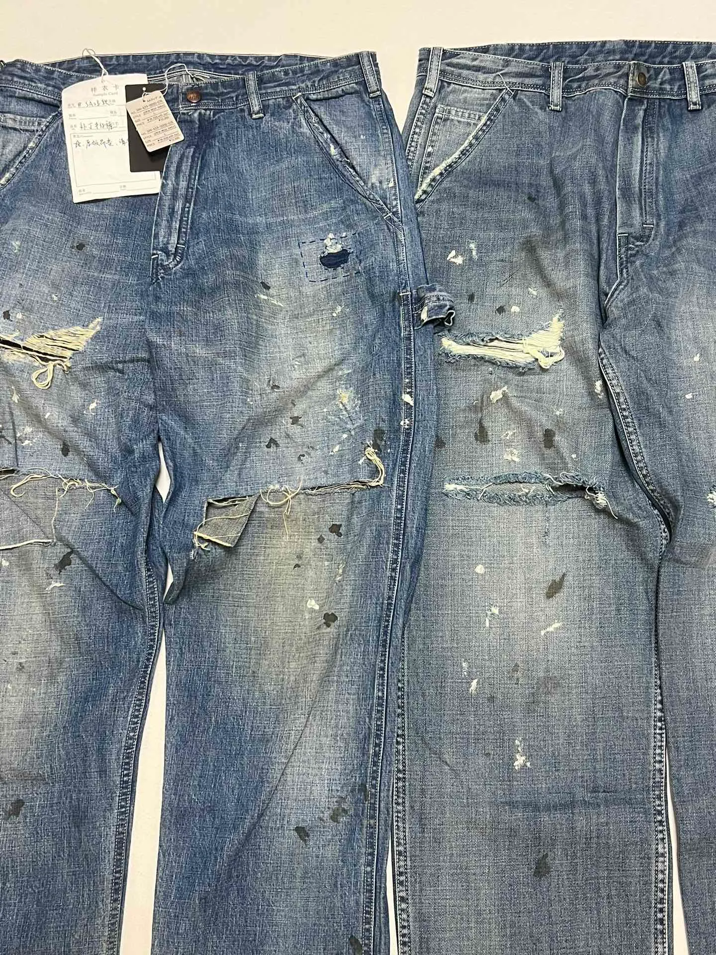 Proofing VS ZP SAINT Mxxxxxx SAINT_DENIM PANTS/PAINTER /BLUE Knife cut holes and splashed ink logging trousers Patch jeans Blue S-XL All accessories are molded and customized Super heavy work Washed and worn Knife cut holes Artificial ink splashed graffiti Genuine version Loose and stylish